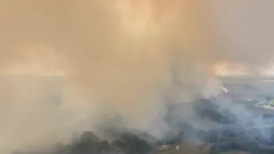 Drone Captures Massive Wildfire Sweeping Across Holt Heath