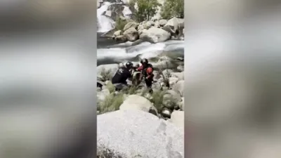 Police Rescue Man That Survives Two Days Trapped Behind Waterfall.