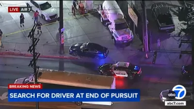 Stolen Car Suspect Refuels During Police Chase.