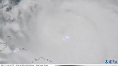 Lightning Flashes Inside Hurricane Erin's Eye.