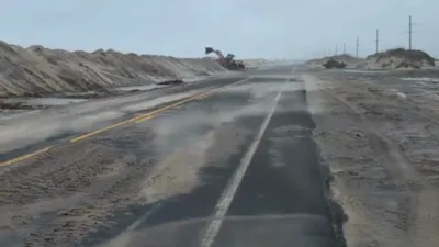 Hurricane Waves Flood North Carolina Highway.