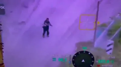 Ukrainian Civilian Disarms Russian Drone by Hand. 