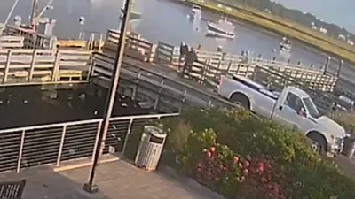 Teen Survives After Truck Plunges Off Dock.