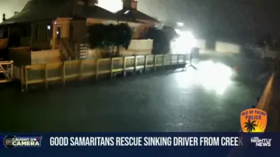 Good Samaritans Save Driver From Sinking Car.