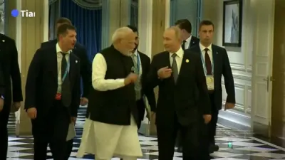 Putin Praises India Ties in Meeting With Modi.