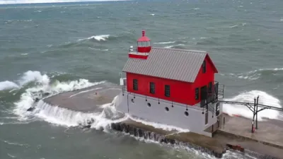 Monster Waves Crash Over Grand Haven Lighthouse.