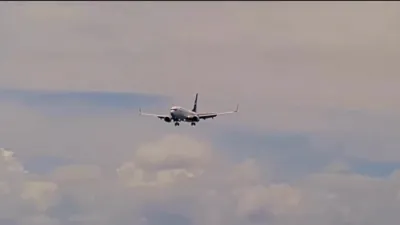 Plane Skids After Gear Collapse.