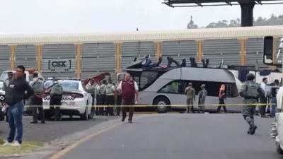 Train Splits Double-Decker Bus in Deadly Mexico Crash.