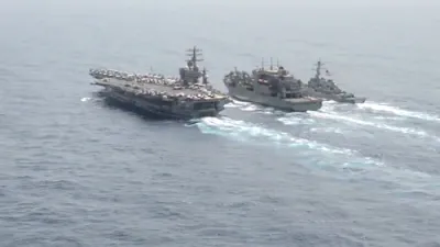 USS Aircraft Carrier Conducts Replenishment-at-Sea in U.S. Central Command Region.