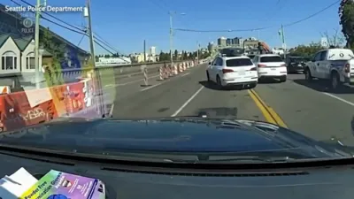 Suspect Launches Car Over Seattle Bridge. 