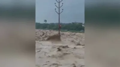 Man Rescued After Hours In Deadly India Floods.