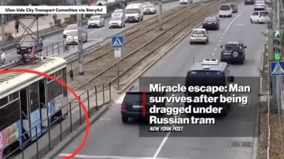 Man Falls Under Moving Tram &mdash; Walks Away Unharmed.