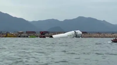UPDATE: Two Dead as Cargo Plane Skids Off Runway in Hong Kong.