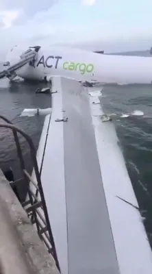 Cargo Jet Skids Off Runway At Hong Kong Airport.