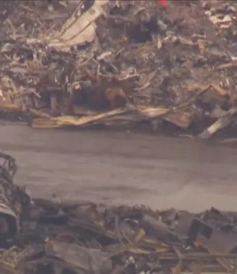 Aerial Footage Shows Wreckage of Louisville UPS Plane Crash That Killed 14.
