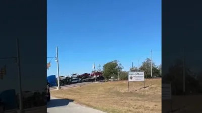 WILD Video: Train Hits Into 18-Wheeler Carrying Cars in Texas.