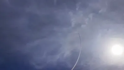 China's J-36 Stealth Fighter Performs Stunning Spiral Maneuver in Dubai Airshow.