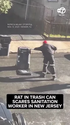 New Jersey Sanitation Worker Startled by Rat in Trash Can.