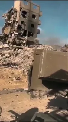 Footage Shows IDF Precision Collapse of Building With .50 Caliber.