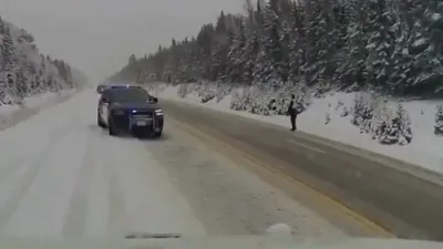 Dashcam Shows OPP Officer Nearly Struck in Icy Highway Spinout