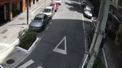 CCTV Shows Suspects Carrying Stolen Masterpieces in Street Escape.