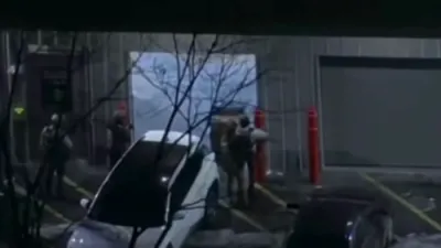 Aerial Footage Shows Salem, NH Police Operation in Suspect Search.
