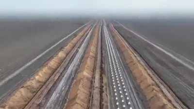 Drone Footage Reveals Ukraine's Extensive Trench Defenses in Foggy Terrain.