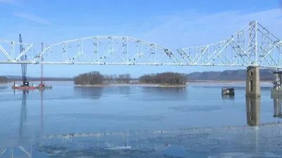 Historic Mississippi River Bridge Falls in Planned Implosion.