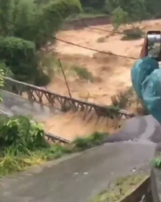 Bridge Collapses Into Floodwaters Amid Deadly Aceh Rains.