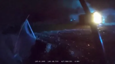 Police Officer Pulls Driver From Burning Car in Daring Rescue.