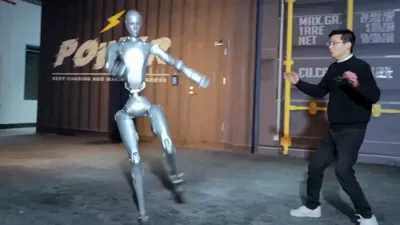 Humanoid Robot Demonstrates Strength and Balance in Training Session.