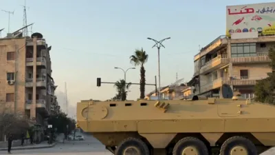 Smoke Rises Over Aleppo as Syrian Forces Begin Bombing.