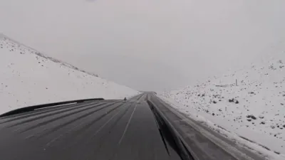 Rare Hawaii Snowfall Covers Volcano Summits Under Winter Warnings.