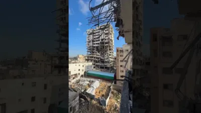 Gazans Warn of Imminent Tower Collapse in Central Gaza City.