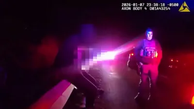 Vehicle Slams Into Police Car During Traffic Stop.