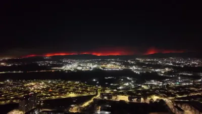 Aerial Footage Shows Penco Wildfire Illuminating Night Sky.