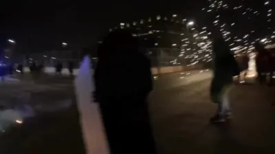 Federal Officers Deploy Flashbangs at Minneapolis Protest Scene.