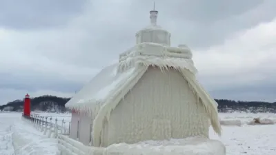 Thick Ice Covers Michigan Lighthouse Ahead of Arctic Blast.