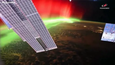 Northern Lights Glow Above Earth in Stunning Space View.