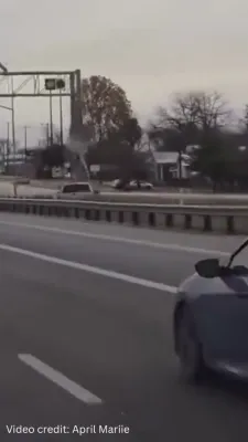 Dashcam Shows a Car Colliding With Overhead Sign.