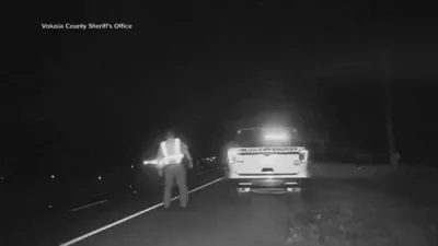 Dashcam Captures Florida Officers Diving Into Ditch to Avoid Crash.