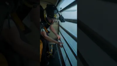 Athletes Perform Daring Wingsuit Flight Around World's Tallest Hotel.