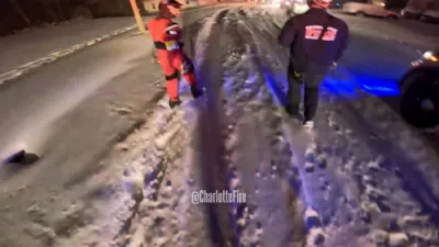 Firefighters Save Stranded Driver During Snowstorm in Charlotte.