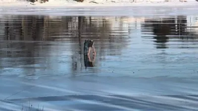 Man Uses Ladder to Ice Sail Across Frozen Potomac River.