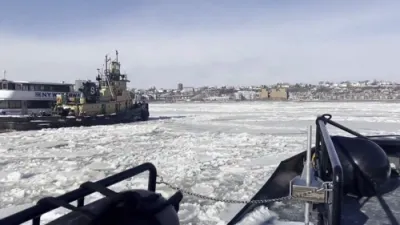 WATCH: Coast Guard Icebreaker Frees NYPD Vessel in Hudson River.