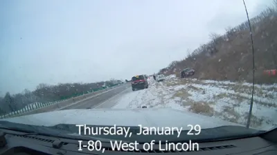 Nebraska Troopers Dodge Disaster as Car Slides Into Their Car.