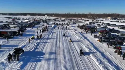 Huge Crowd Fills Frozen Lake St. Clair for Ice Race Event.