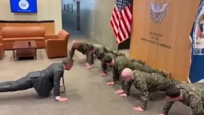 Ambassador Waltz Performs Push-Ups with Marines.