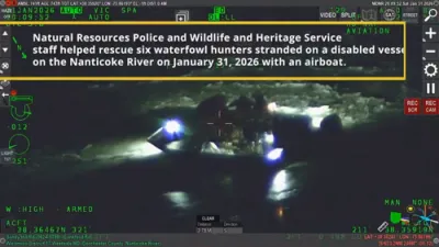 Helicopters and Airboat Save Stranded Hunters on Frozen River .