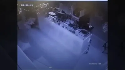 CCTV Footage of Jewelry Thief on Forklift That Uses Donkey to Escape.